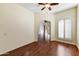 Bright bedroom with hardwood floors and access to other rooms at 8653 E Royal Palm Rd # 2005, Scottsdale, AZ 85258
