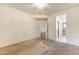 Spacious bedroom with plush carpet and a chandelier at 8653 E Royal Palm Rd # 2005, Scottsdale, AZ 85258