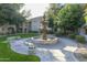 Community courtyard with fountain and landscaping at 8653 E Royal Palm Rd # 2005, Scottsdale, AZ 85258