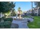 Community courtyard with fountain and landscaping at 8653 E Royal Palm Rd # 2005, Scottsdale, AZ 85258