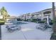 Community pool area with plenty of lounge chairs at 8653 E Royal Palm Rd # 2005, Scottsdale, AZ 85258