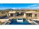 Contemporary home with stunning mountain views and a pool at 9983 E Mirabel Club Dr, Scottsdale, AZ 85262