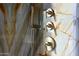 High-end shower with marble tile and multiple shower heads at 9983 E Mirabel Club Dr, Scottsdale, AZ 85262