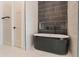 Modern bathroom with freestanding tub and dark tile accents at 11404 S 208Th Ave, Buckeye, AZ 85326