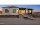 Modern home exterior, showcasing architectural details and landscaping at 11404 S 208Th Ave, Buckeye, AZ 85326