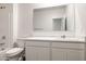 Clean bathroom with white cabinets and a bathtub at 18350 W Smoketree Dr, Wittmann, AZ 85361