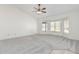 Living room with bay window and neutral carpeting at 2286 W Moon Vista St, Apache Junction, AZ 85120