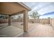 Covered patio overlooks a spacious backyard with fire pit at 274 S 18Th St, Coolidge, AZ 85128