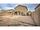 Two-story house with backyard patio, fire pit and landscaping at 274 S 18Th St, Coolidge, AZ 85128