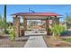 Community gazebo with picnic tables and trash cans at 28233 N 134Th Ave Ave, Peoria, AZ 85383