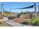 Community playground with shaded seating areas at 28233 N 134Th Ave Ave, Peoria, AZ 85383