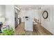 Modern kitchen with island, stainless steel appliances, and white cabinets at 3131 N Central Ave # 5017, Phoenix, AZ 85012