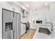 Modern kitchen with stainless steel appliances and white cabinets at 3131 N Central Ave # 5017, Phoenix, AZ 85012