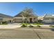 Craftsman style home with two-car garage and mature tree at 4341 E Evelyn St, Gilbert, AZ 85295