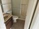 Bathroom with shower, toilet and vanity with marble top at 4766 W Rose Ln, Glendale, AZ 85301