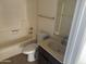 Bathroom with shower/tub combo, toilet, and vanity at 4766 W Rose Ln, Glendale, AZ 85301