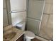 Bathroom with shower, toilet and vanity with marble top at 4766 W Rose Ln, Glendale, AZ 85301