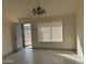 Bright entryway with tile flooring, a window with blinds, and a view of the front door at 4766 W Rose Ln, Glendale, AZ 85301