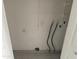 Unfinished laundry room with hookups for washer/dryer at 4766 W Rose Ln, Glendale, AZ 85301