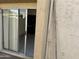 Sliding glass door leads to a patio and shows a kitchen at 4766 W Rose Ln, Glendale, AZ 85301