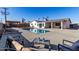 Relaxing backyard oasis featuring a sparkling pool and patio furniture at 6517 W Georgia Ave, Glendale, AZ 85301