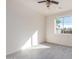 Spacious bedroom with tile floors and a window with natural light at 9307 W Jefferson St, Tolleson, AZ 85353