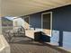 Covered deck with seating area and storage at 10120 E Mclellan Rd, Mesa, AZ 85207