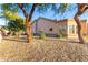 House exterior showcasing landscaping and desert plants at 19124 N 83Rd Ln, Peoria, AZ 85382