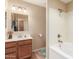 Modern bathroom with a soaking tub, vanity, and updated fixtures at 1925 W 2Nd St, Mesa, AZ 85201