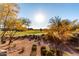 Lush green fairways and desert landscaping at 21320 N 56Th St # 1094, Phoenix, AZ 85054