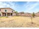 Two story house with covered patio and spacious backyard at 25370 W Jackson Ave, Buckeye, AZ 85326