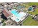 Community pool, playground, and tennis courts at 35595 W Mallorca Ave, Maricopa, AZ 85138