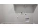 Laundry room with built-in shelving and hookups at 35595 W Mallorca Ave, Maricopa, AZ 85138