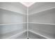 Bright and spacious pantry with ample shelving at 35595 W Mallorca Ave, Maricopa, AZ 85138