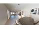 Open dining area with dark wood table and kitchen island view at 4115 E Kolin Ln, San Tan Valley, AZ 85143