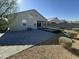 Artificial turf and paved patio backyard at 7834 W Forest Grove Ave, Phoenix, AZ 85043