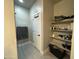 Bathroom with linen closet and shelving at 7834 W Forest Grove Ave, Phoenix, AZ 85043