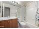 Bathroom with a shower/tub combo, vanity, and toilet at 811 N Longmore St, Chandler, AZ 85224