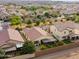 Aerial view of house and surrounding neighborhood at 9736 E Thatcher Ave, Mesa, AZ 85212