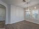 Spacious dining room with chandelier and plantation shutters at 10582 W Salter Dr, Peoria, AZ 85382