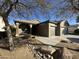 House with a two-car garage and desert landscaping at 10582 W Salter Dr, Peoria, AZ 85382