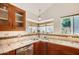 Corner sink and wood cabinets in kitchen at 1335 W Manor St, Chandler, AZ 85224