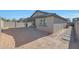 Landscaped backyard with block wall at 15072 W Mckinley St, Goodyear, AZ 85338