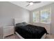 Bedroom with a queen bed, nightstand and dresser at 15072 W Mckinley St, Goodyear, AZ 85338