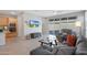 Spacious living room with sliding glass doors leading to the backyard at 15072 W Mckinley St, Goodyear, AZ 85338