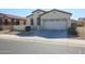 One-story home with two-car garage and desert landscaping at 17915 W Silver Fox Way, Goodyear, AZ 85338