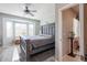 Spacious main bedroom with large bed and bay window at 17915 W Silver Fox Way, Goodyear, AZ 85338