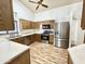 Modern kitchen, stainless steel appliances and light wood cabinets at 18024 N 36Th Ln, Glendale, AZ 85308