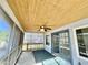 Relaxing screened porch with ceiling fan and French doors at 18024 N 36Th Ln, Glendale, AZ 85308