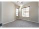Simple bedroom with window and carpet at 18174 W Wind Song Ave, Goodyear, AZ 85338